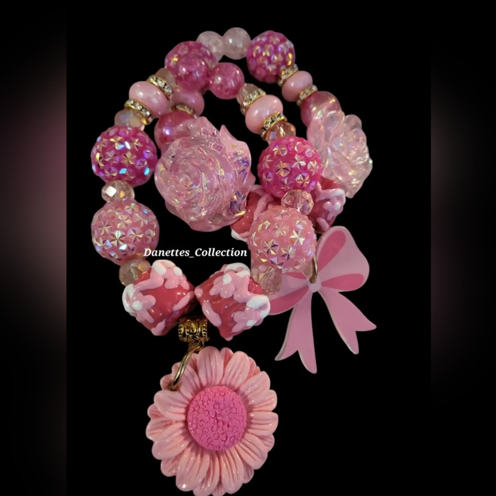 2 piece Piink Beaded Bracelets with Flower and bow Charm